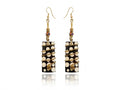 Boucles d'oreille Mzunguko - pavé corne de buffle à pois, spirale dorée